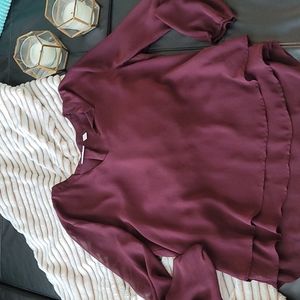 A burgundy blouse
